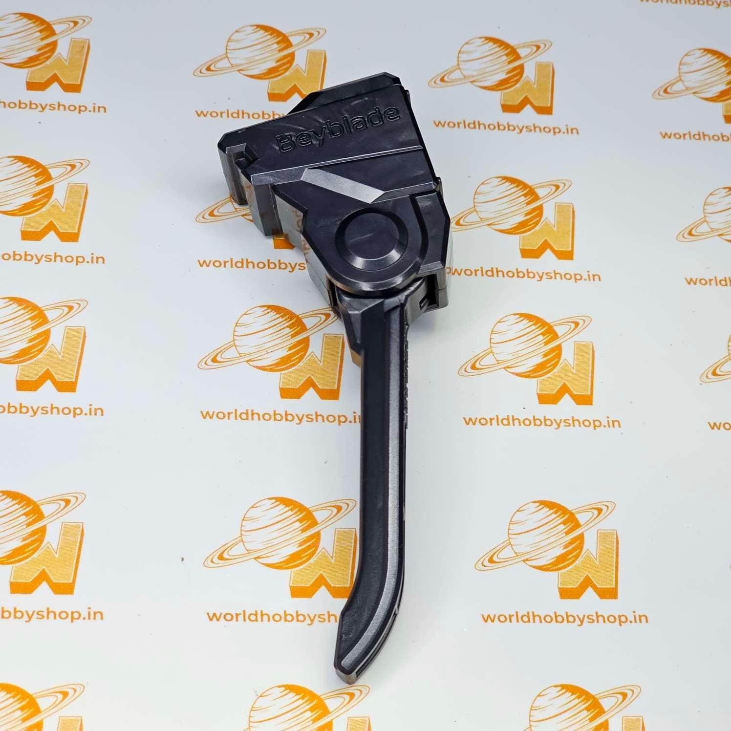Grey Takara Tomy Power Trigger accessory for a Beyblade Burst Launcher Grip, actual unit photographed
